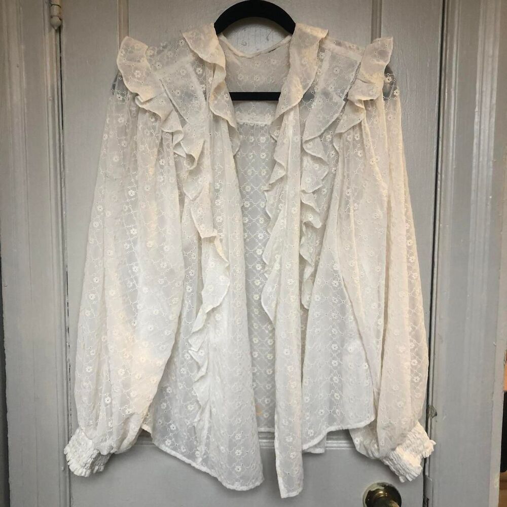 Beautiful white floral embroidered ruffled blouse